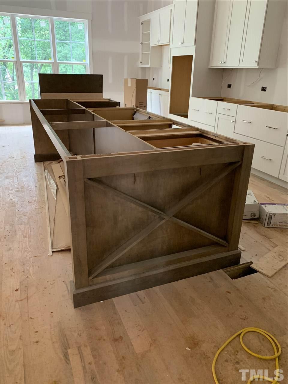 4224 Lambeth Drive Raleigh, NC 27609 - Photo 6 of 7 a stove top oven sitting inside of a kitchen