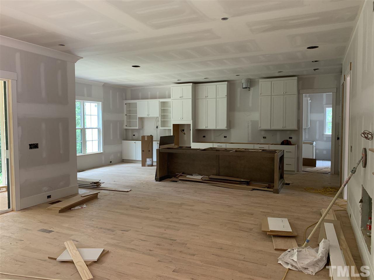 4224 Lambeth Drive Raleigh, NC 27609 - Photo 7 of 7 a living room with furniture window and wooden floor
