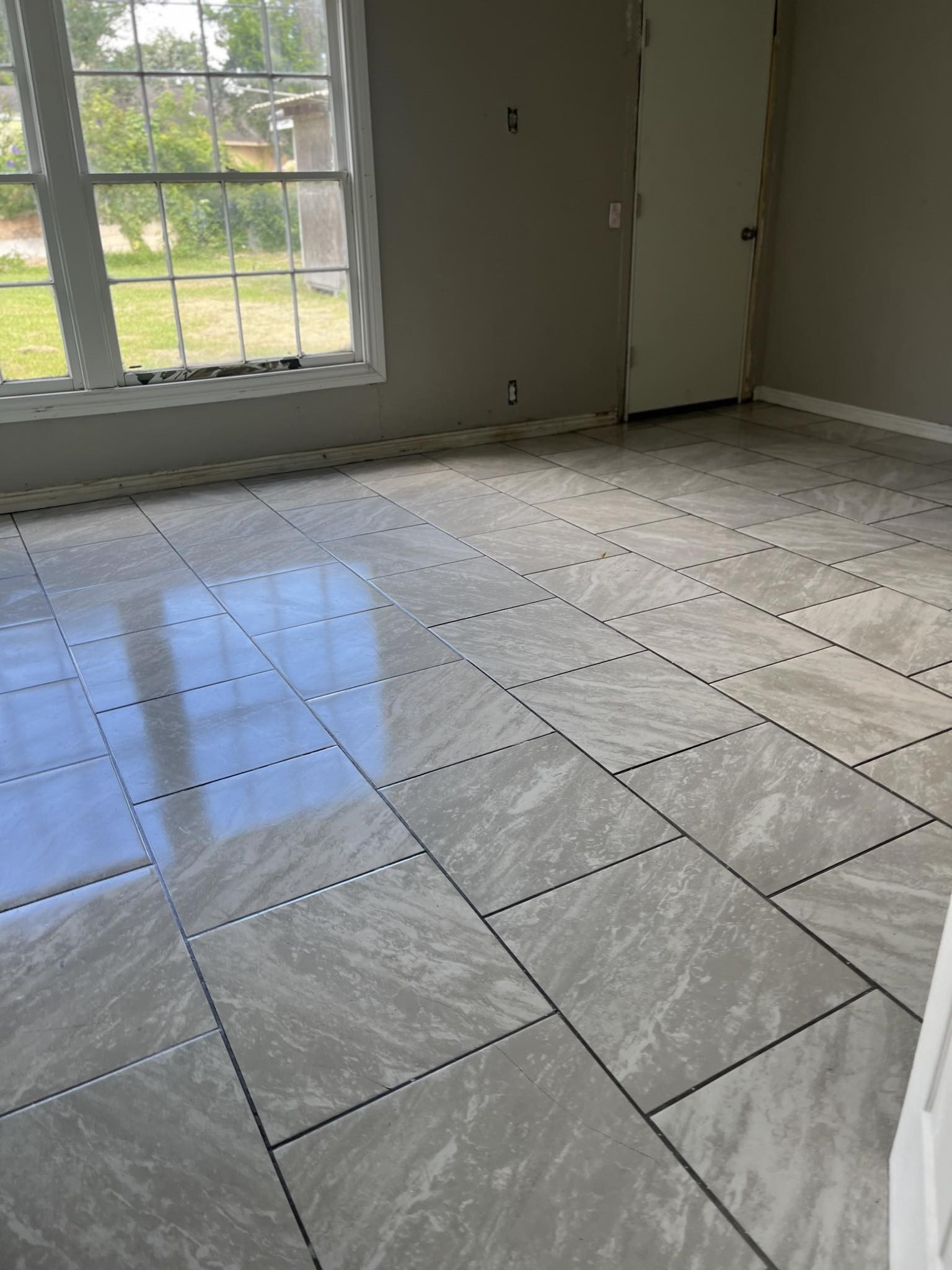4980 Chambers Street Beaumont, TX 77705 - Photo 13 of 23 a view of an empty room with a window