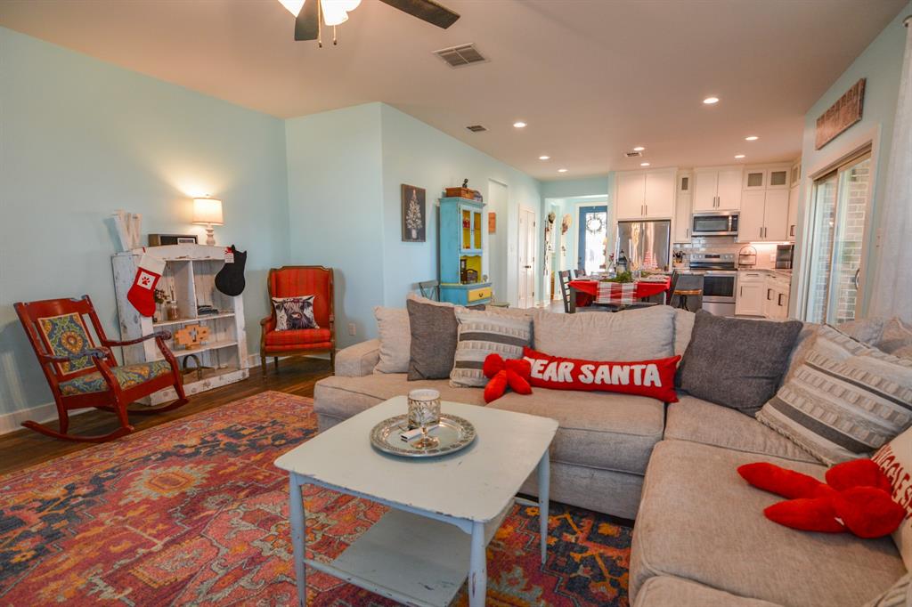 601 Mathew Street Grandview, TX 76050 - Photo 17 of 40 a living room with furniture and kitchen view
