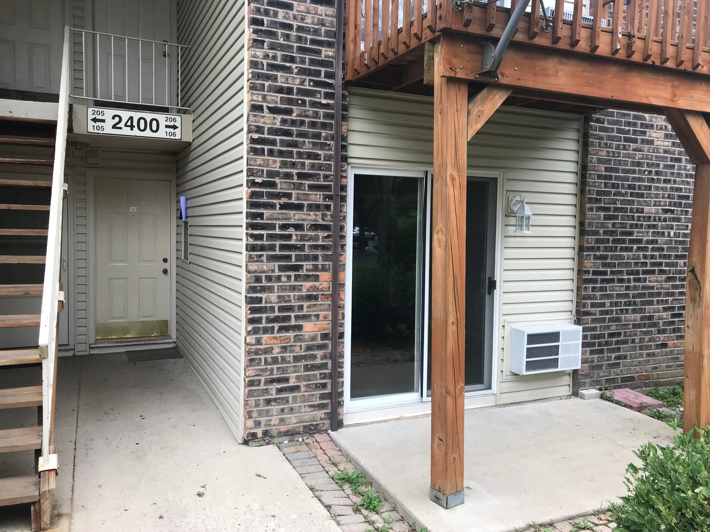 2400 Light Road, Unit 106 Oswego, IL 60543 - Photo 1 of 13 a view of a door of the house