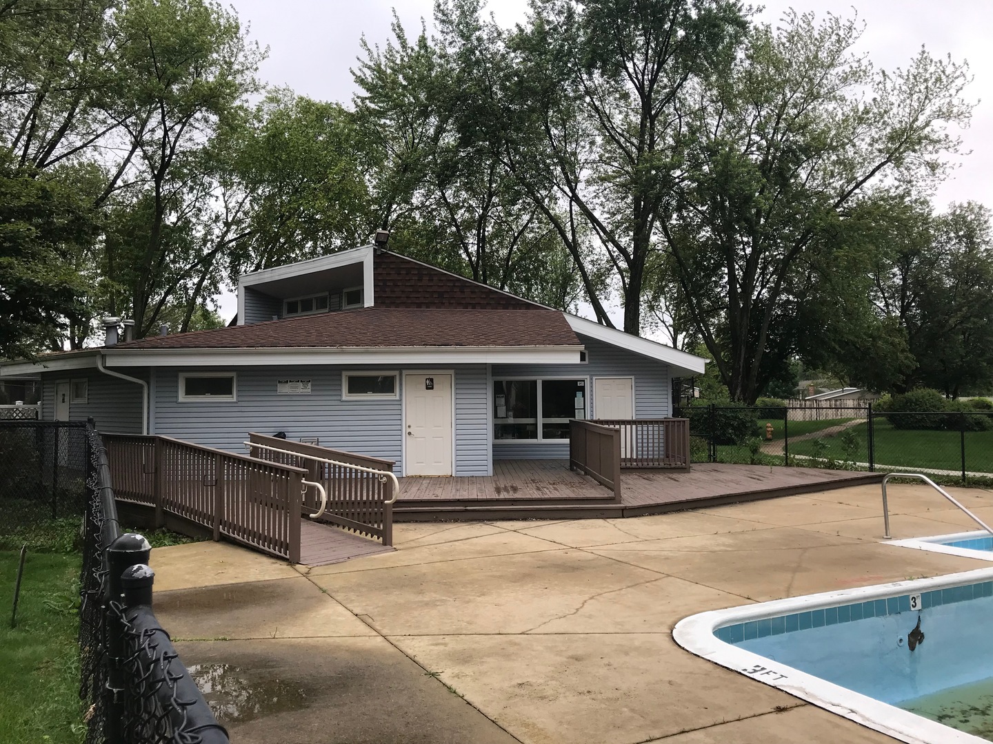 2400 Light Road, Unit 106 Oswego, IL 60543 - Photo 11 of 13 a view of a house with backyard