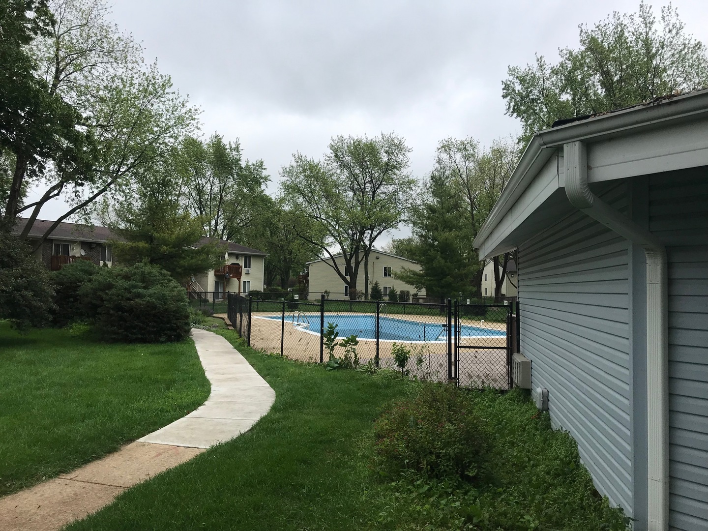 2400 Light Road, Unit 106 Oswego, IL 60543 - Photo 12 of 13 a view of a park with plants and trees