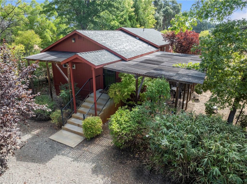 a view of a table and chairs under an umbrella