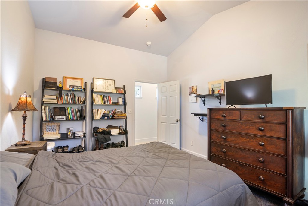 2145 Big Valley Road Lakeport, CA 95453 - Photo 13 of 45 a bedroom with a bed and a flat screen tv