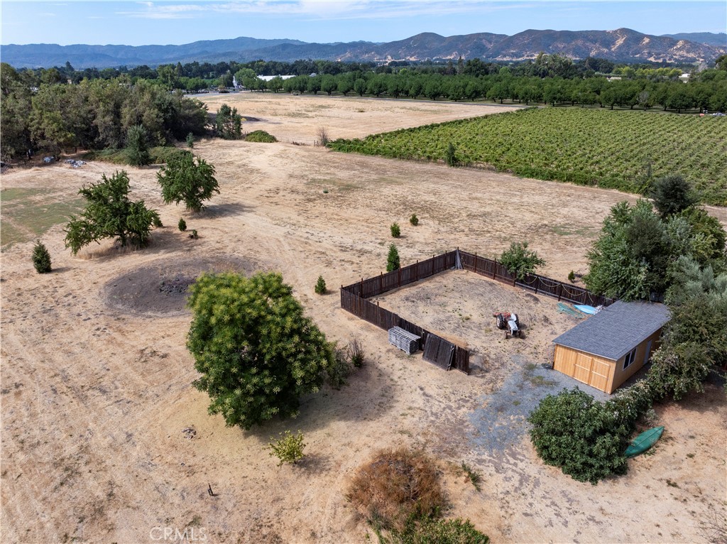2145 Big Valley Road Lakeport, CA 95453 - Photo 3 of 45 an aerial view of a house with a yard and lake view