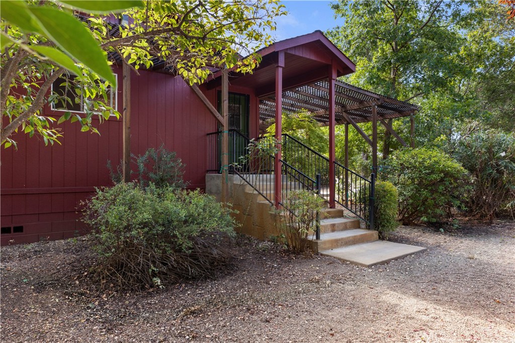 2145 Big Valley Road Lakeport, CA 95453 - Photo 31 of 45 a view of a wooden house with a yard