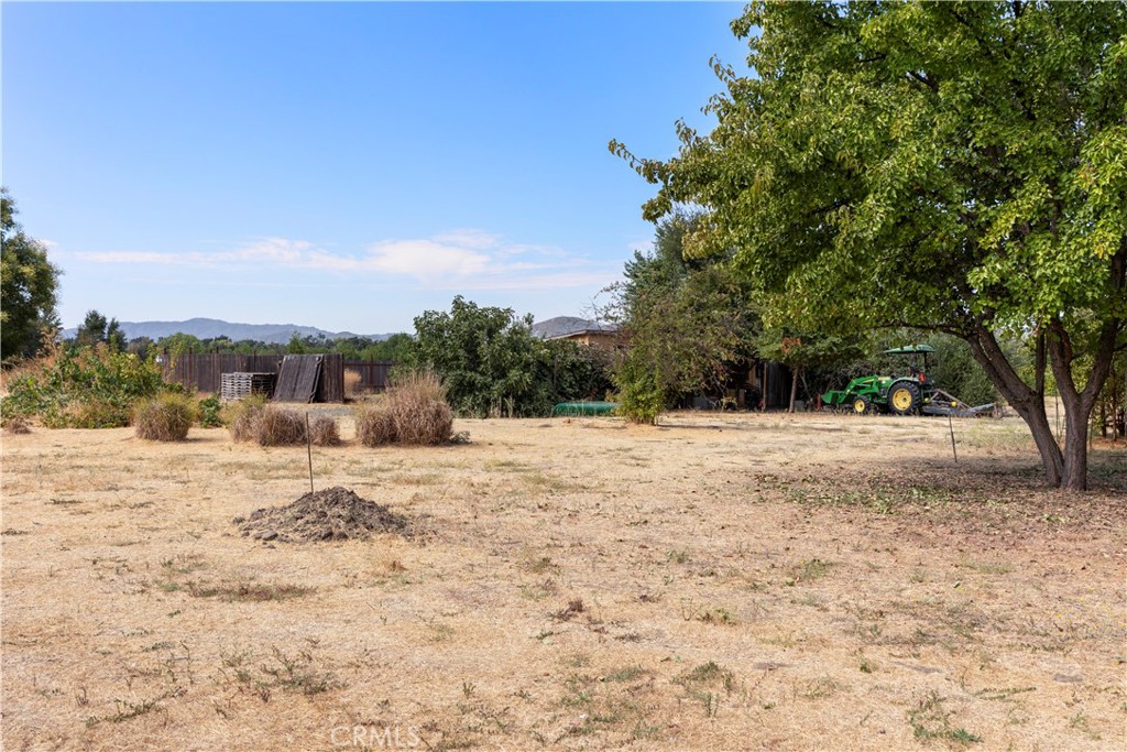 2145 Big Valley Road Lakeport, CA 95453 - Photo 45 of 45 a view of dirt yard with a large tree