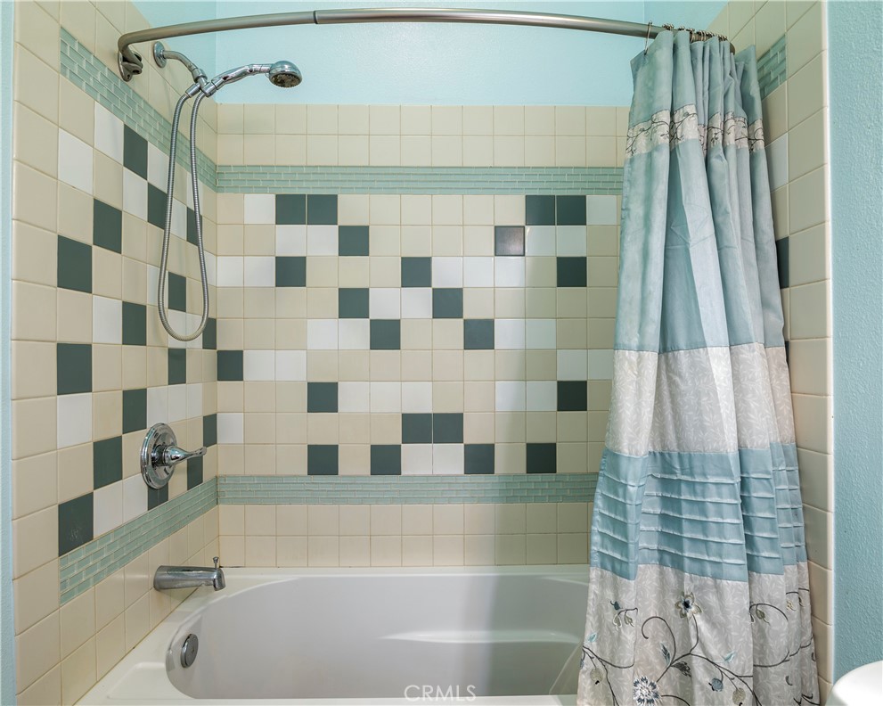 2145 Big Valley Road Lakeport, CA 95453 - Photo 7 of 45 a bathroom with a bathtub and a shower