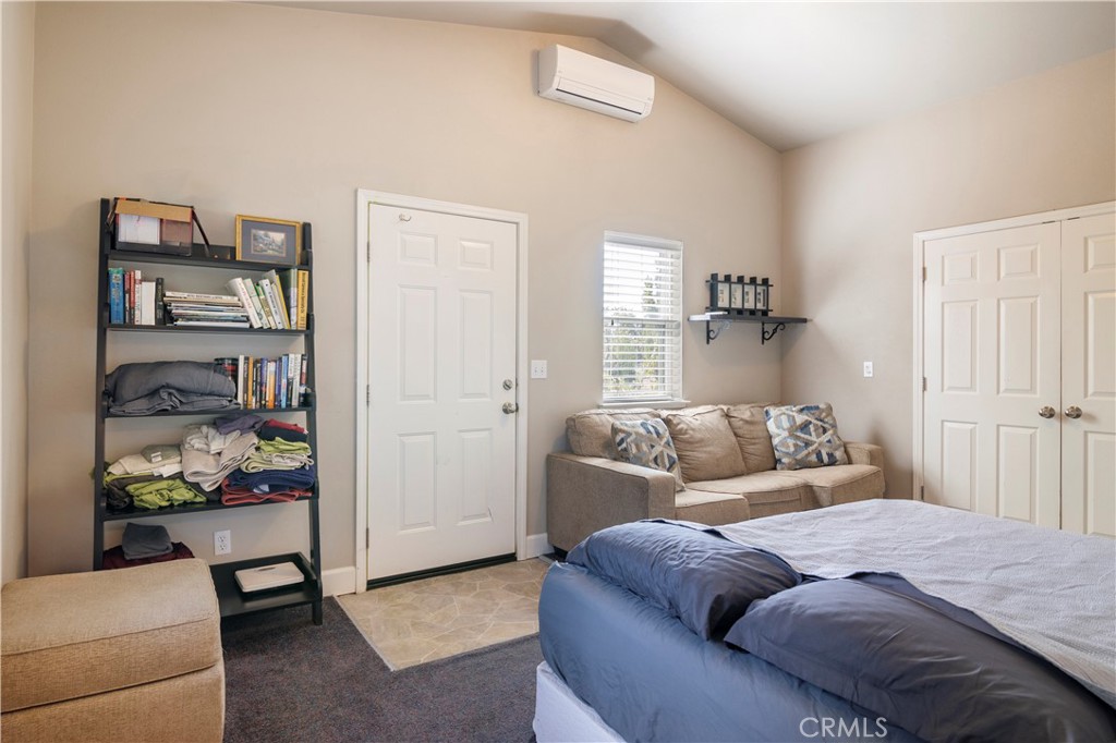 2145 Big Valley Road Lakeport, CA 95453 - Photo 8 of 45 a bedroom with a bed and a window