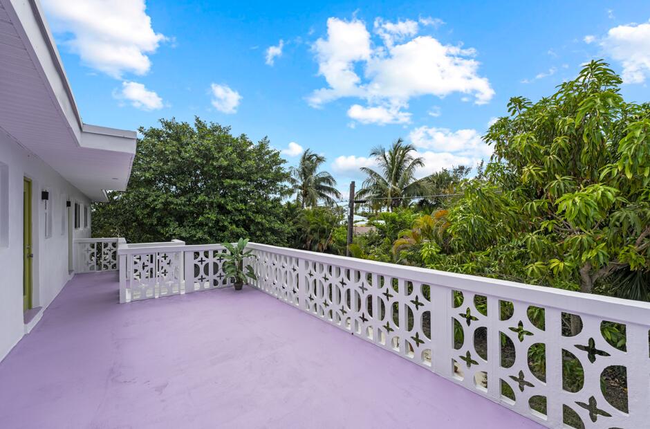 1279 Beach Road, Unit 2 Singer Island, FL 33404 - Photo 19 of 20 a view of a terrace with sitting area