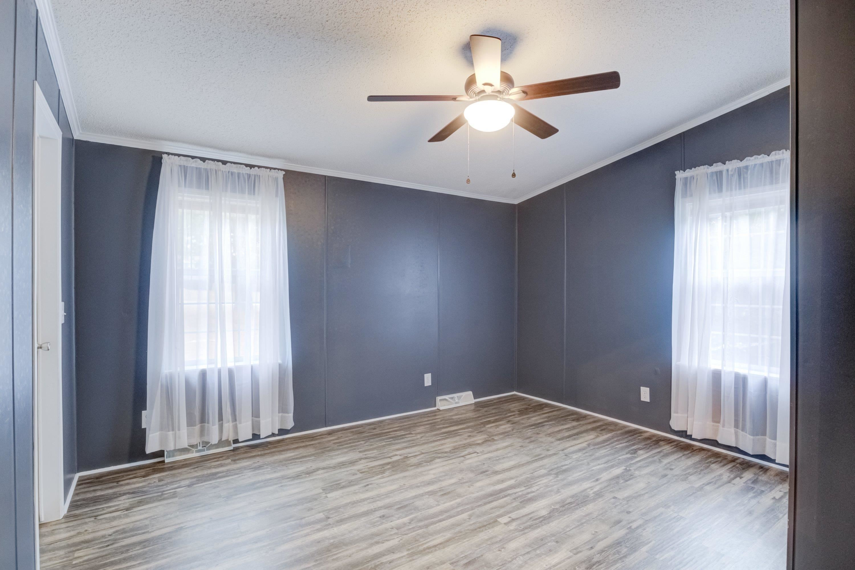32 Red Oak Drive Smithfield, NC 27577 - Photo 29 of 47 wooden floor in an empty room with a window
