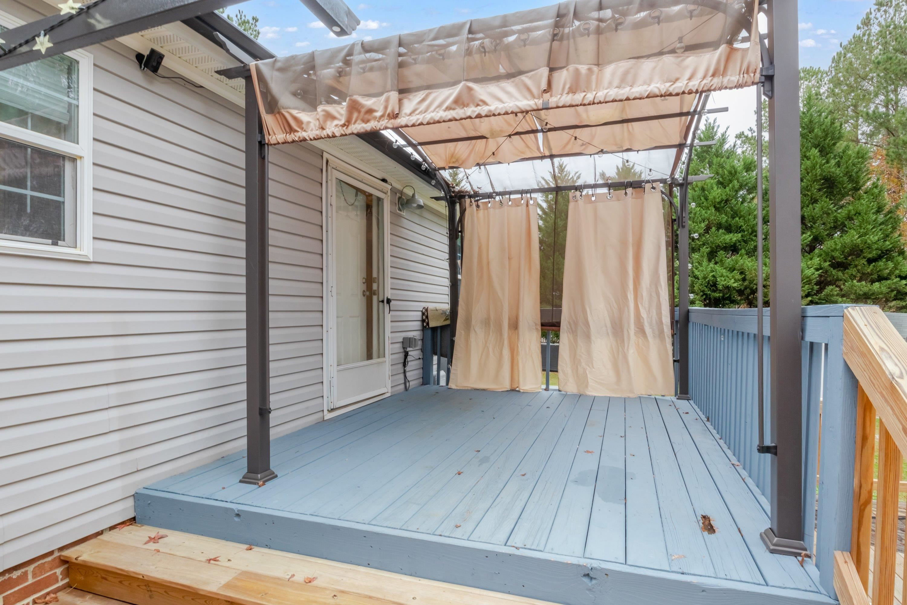32 Red Oak Drive Smithfield, NC 27577 - Photo 36 of 47 a view of a porch with wooden floor
