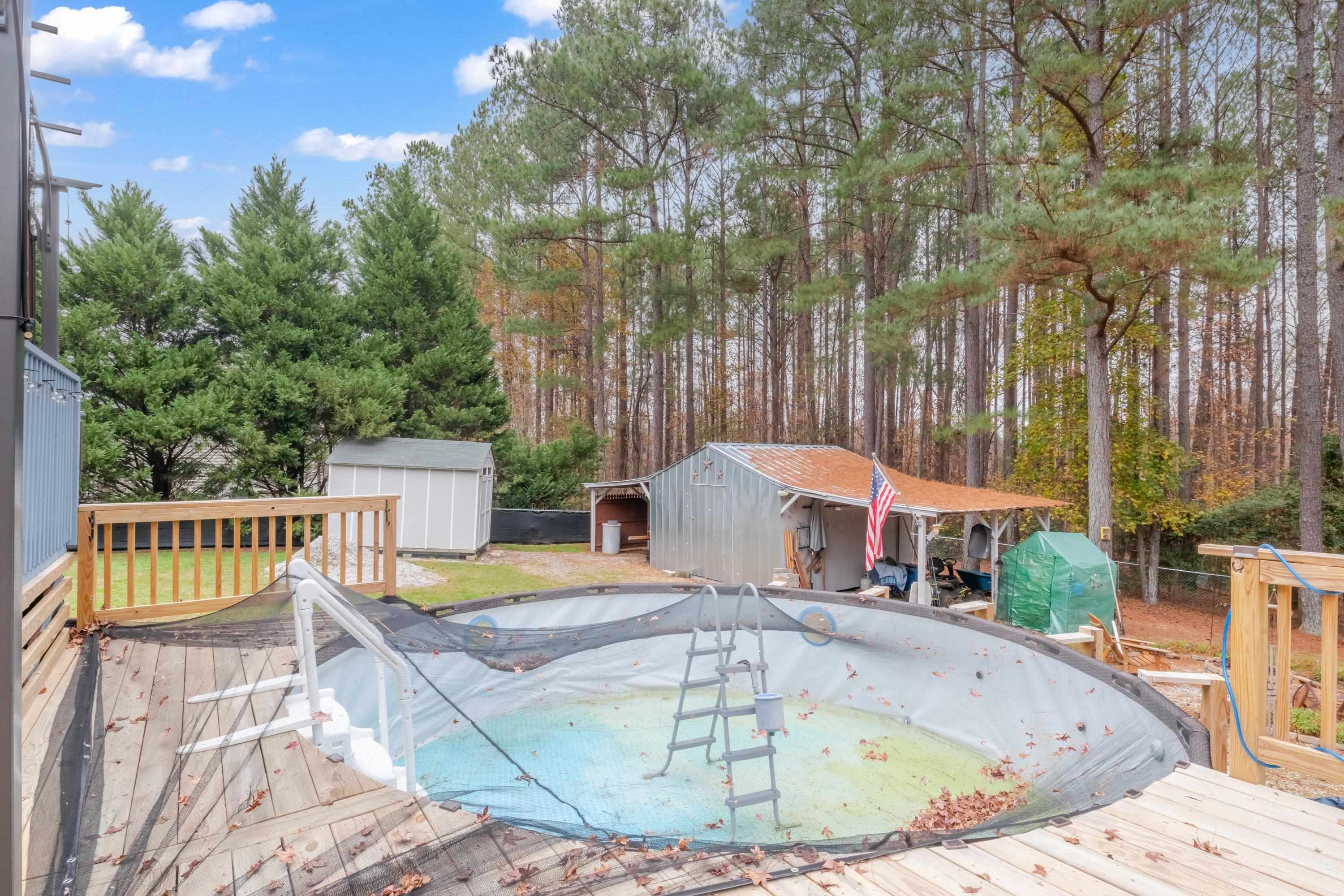 32 Red Oak Drive Smithfield, NC 27577 - Photo 38 of 47 a view of a swimming pool with a patio