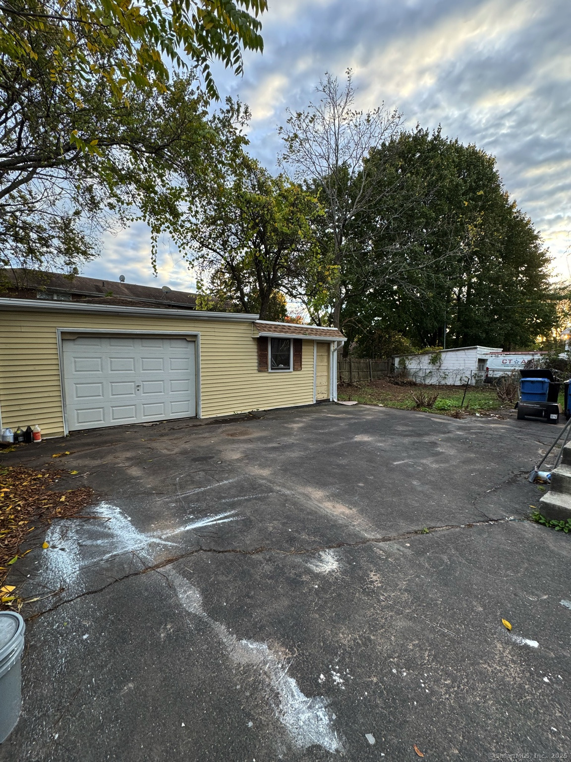 54 Overlook Avenue New Britain, CT 06053 - Photo 7 of 10 a view of garage with a barbeque and trees