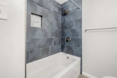 a bathroom with a bathtub