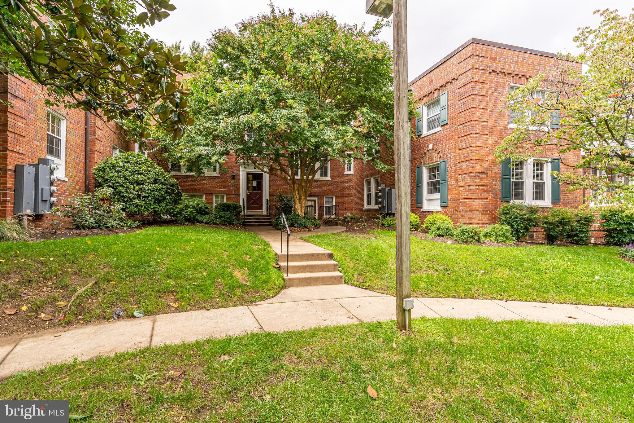 1728 North Rhodes Street, Unit 5275 Arlington, VA 22201 - Photo 2 of 19 Street views onto manicured lawn