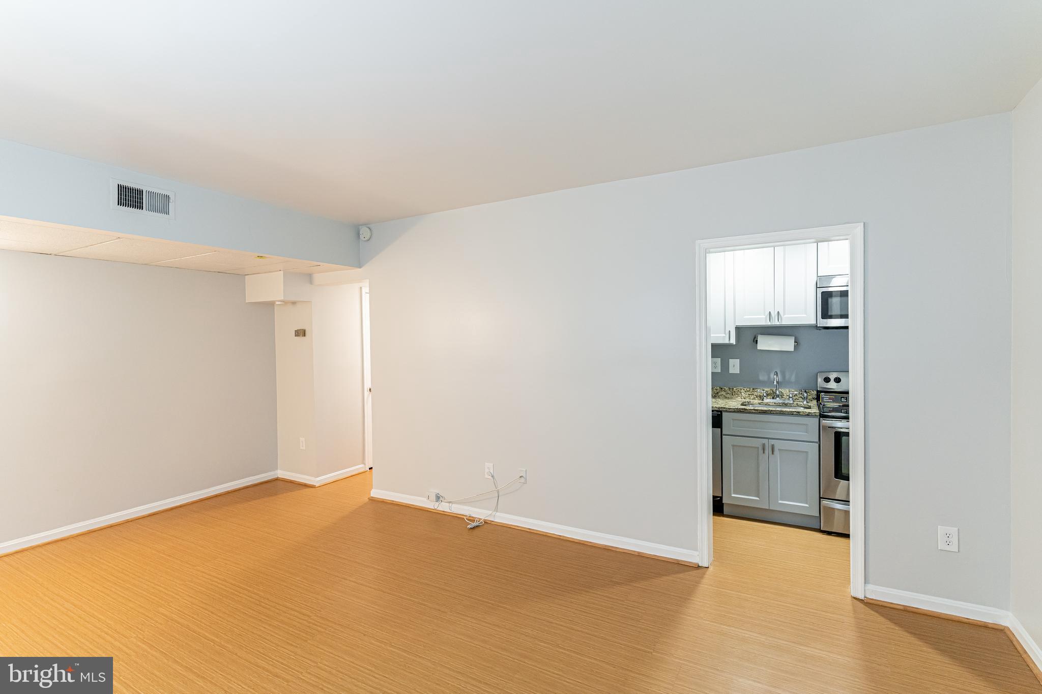 1728 North Rhodes Street, Unit 5275 Arlington, VA 22201 - Photo 7 of 19 Spacious dining/ living room