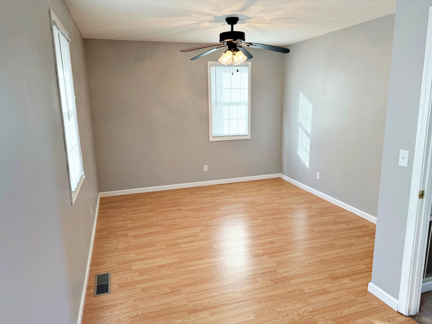 1062 Cedar Lane Metropolis, IL 62960 - Photo 24 of 30 wooden floor in an empty room with a window