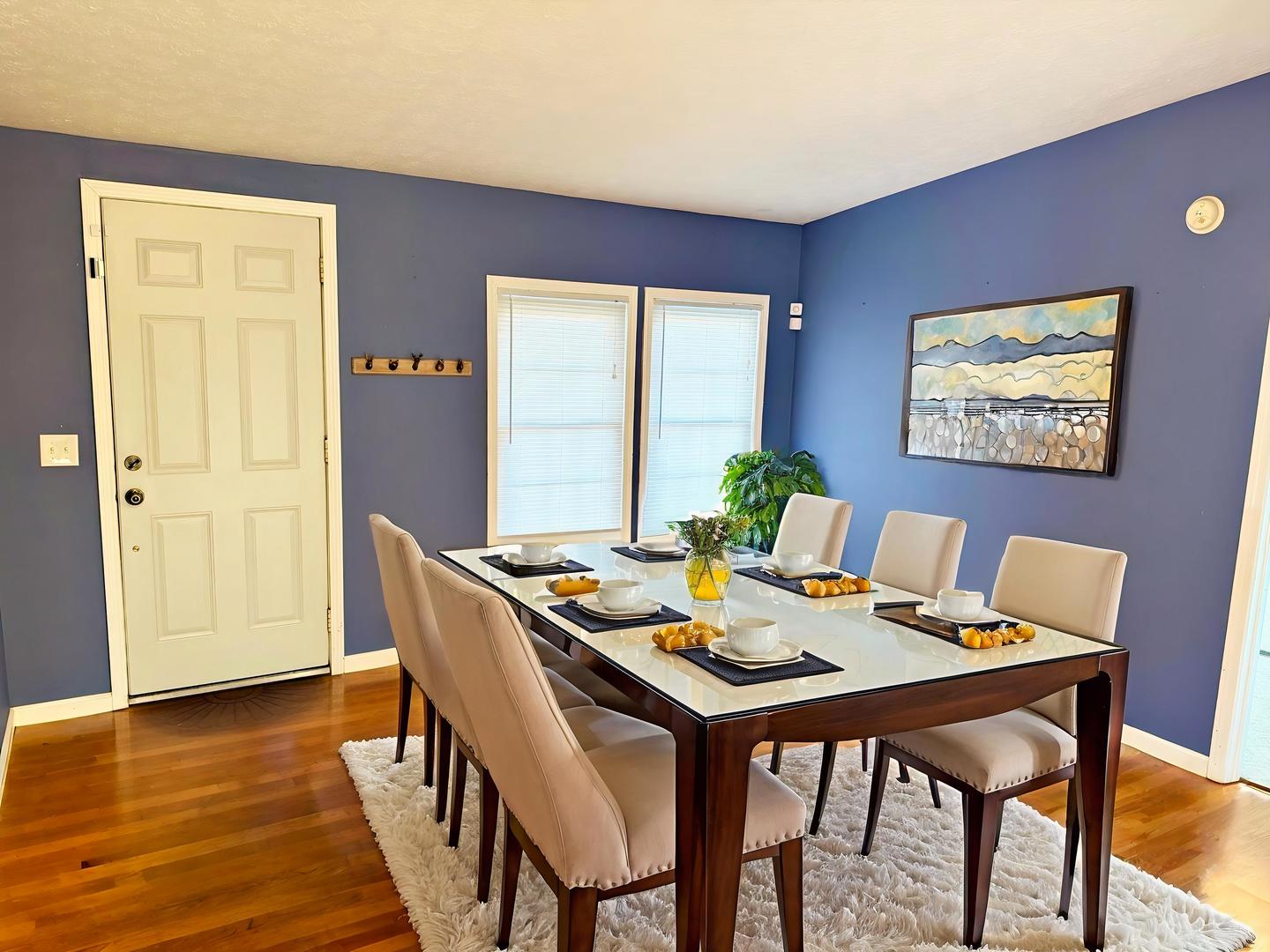 1062 Cedar Lane Metropolis, IL 62960 - Photo 4 of 30 a view of a dining room with furniture window and wooden floor
