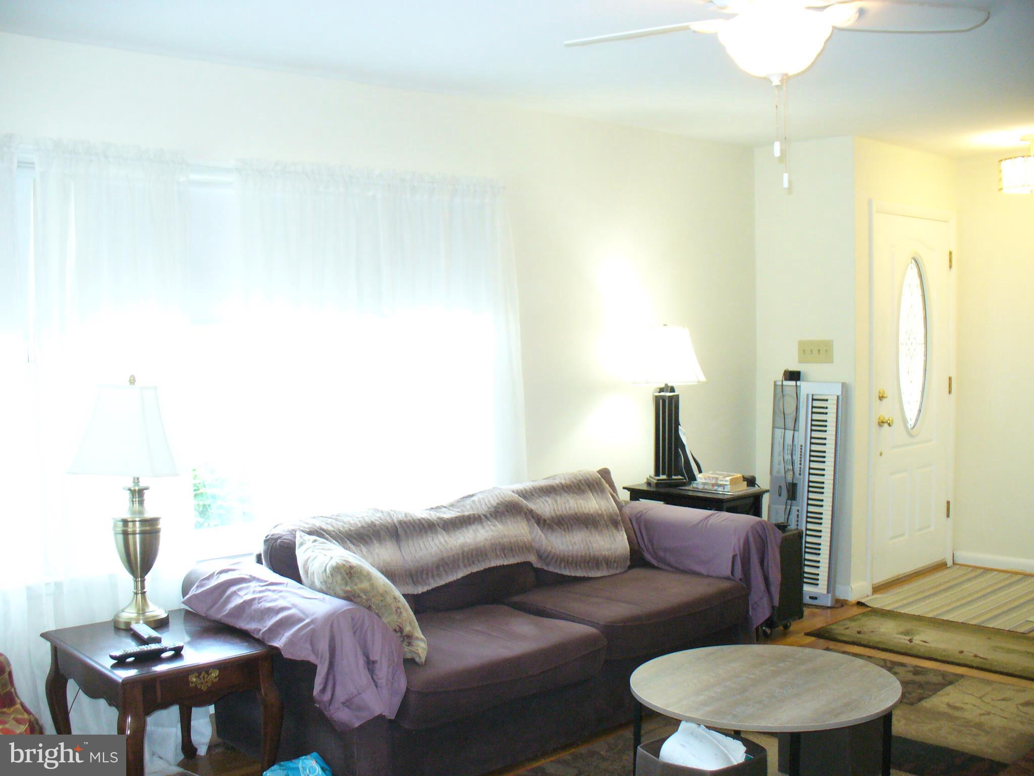 1016 10th Street Laurel, MD 20707 - Photo 13 of 37 Living room, big windows