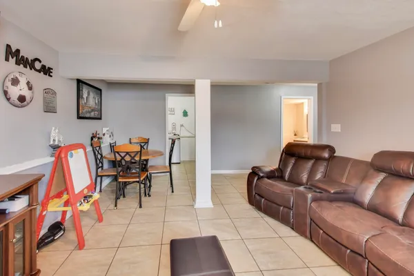 a living room with furniture and a table