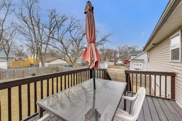 a view of balcony with furniture