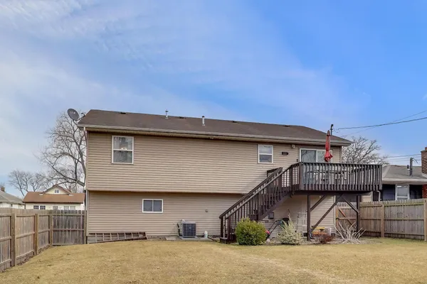 a front view of a house with garage