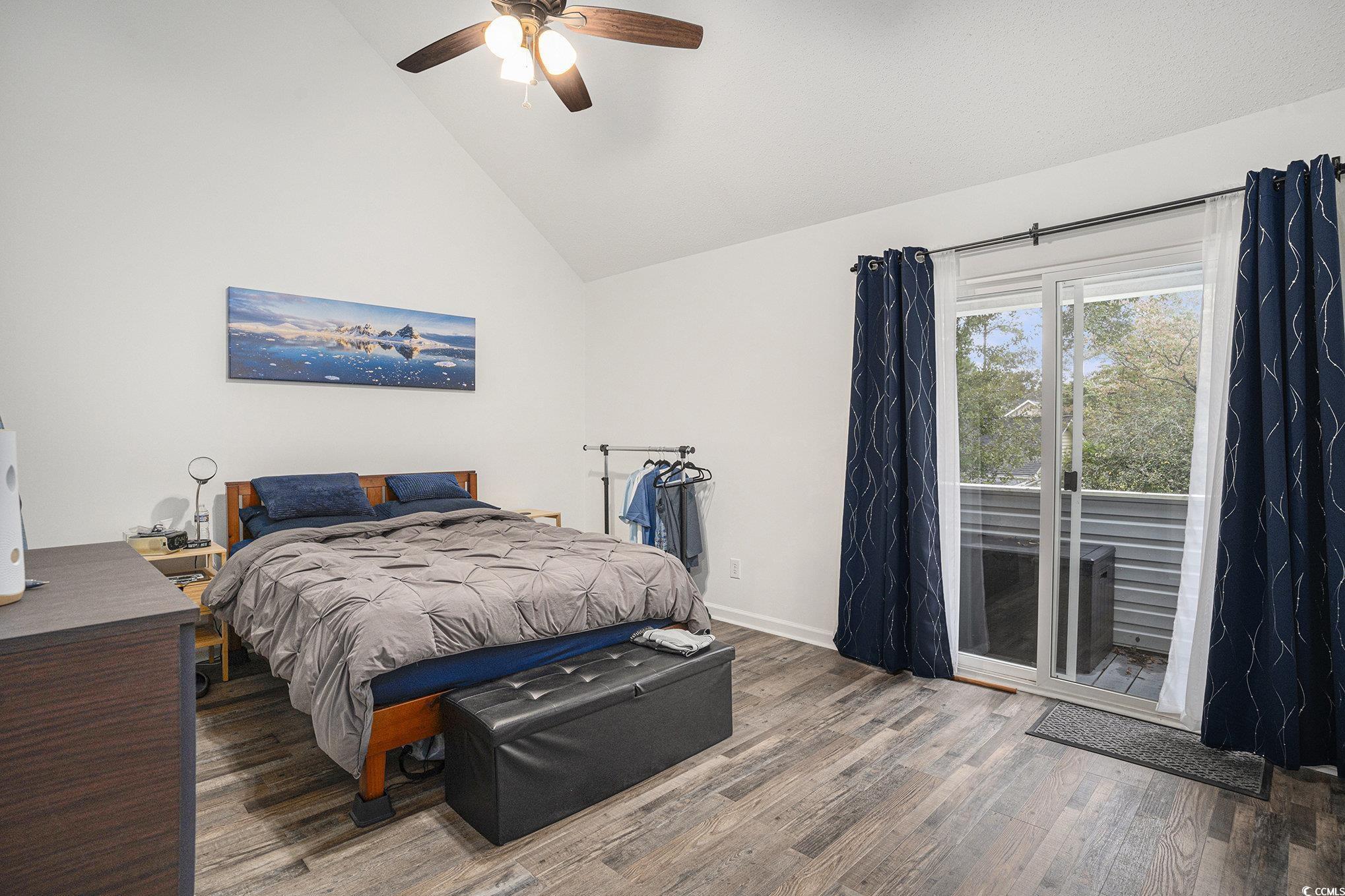 400 Cambridge Circle, Unit L8 Murrells Inlet, SC 29576 - Photo 9 of 22 Bedroom with access to exterior, high vaulted ceiling, wood finished floors, and ceiling fan