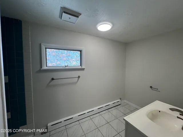 a view of a bathroom with a sink