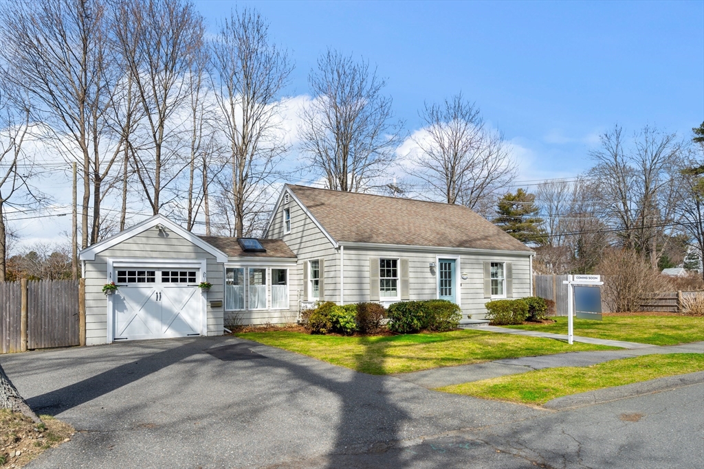 38 Carlton Road Marblehead, MA 01945 - Photo 2 of 36 a view of a white house with a large pool and large trees