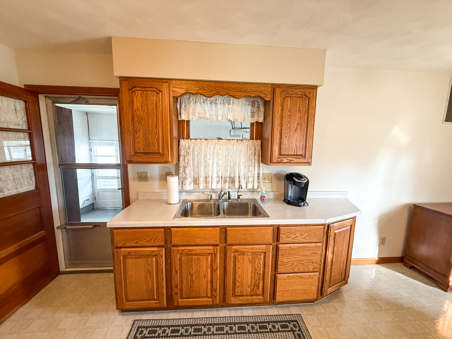 218 South 3rd Street Southwest Clay City, IL 62824 - Photo 13 of 63 a bathroom with a sink a mirror and window