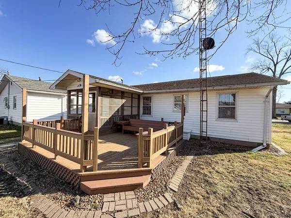 a front view of a house with a porch