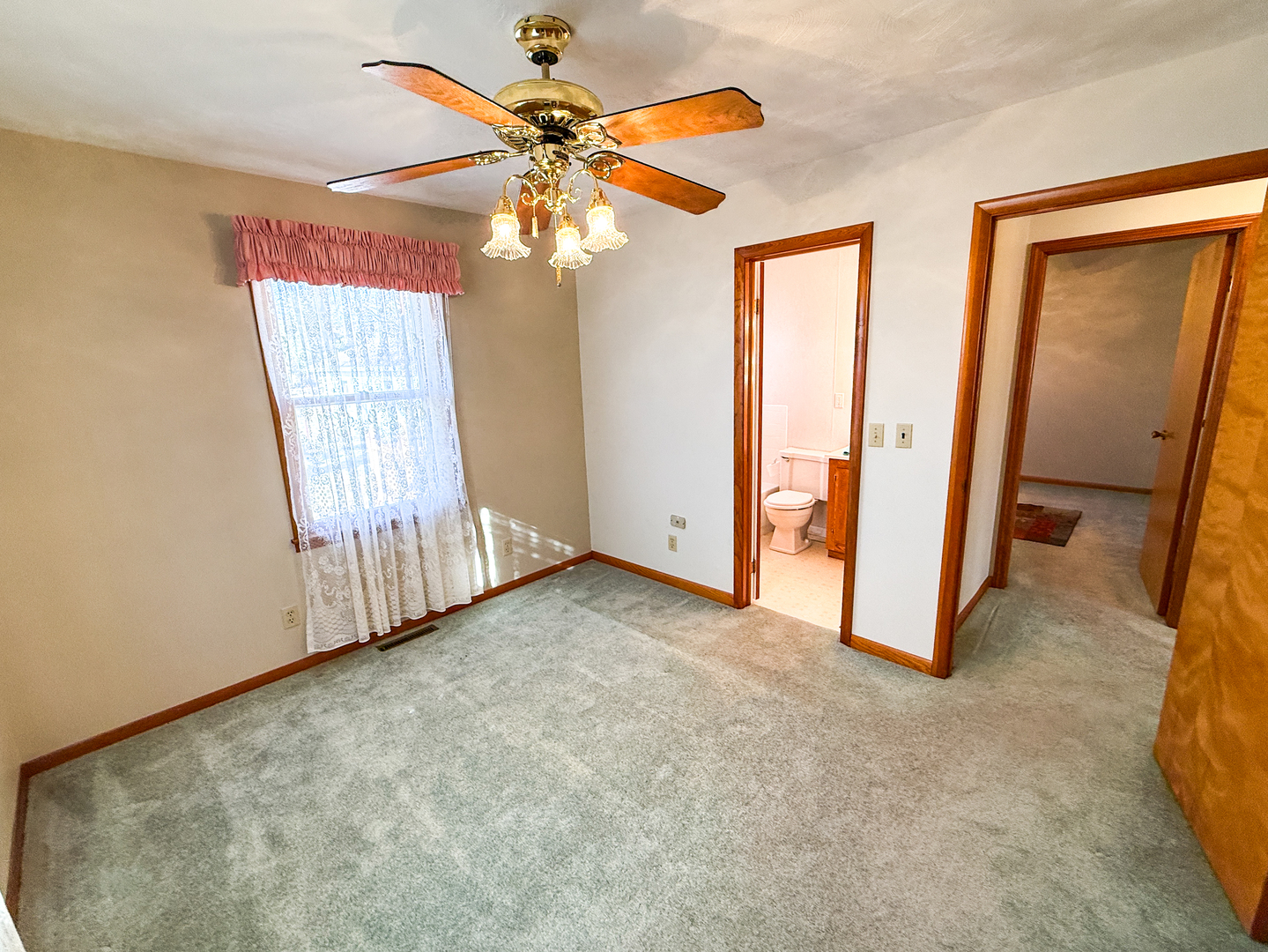 218 South 3rd Street Southwest Clay City, IL 62824 - Photo 21 of 63 an empty room with windows and fan