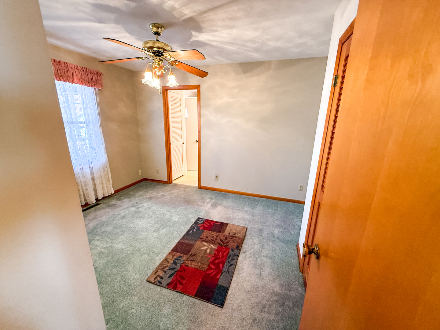 218 South 3rd Street Southwest Clay City, IL 62824 - Photo 28 of 63 a view of a room with window and a ceiling fan