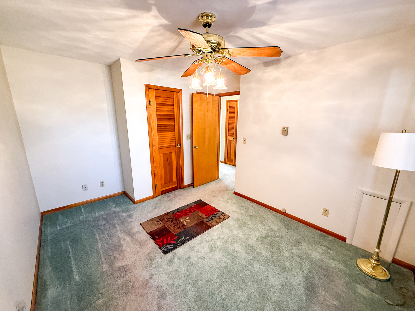 218 South 3rd Street Southwest Clay City, IL 62824 - Photo 29 of 63 a very nice looking room with a ceiling fan