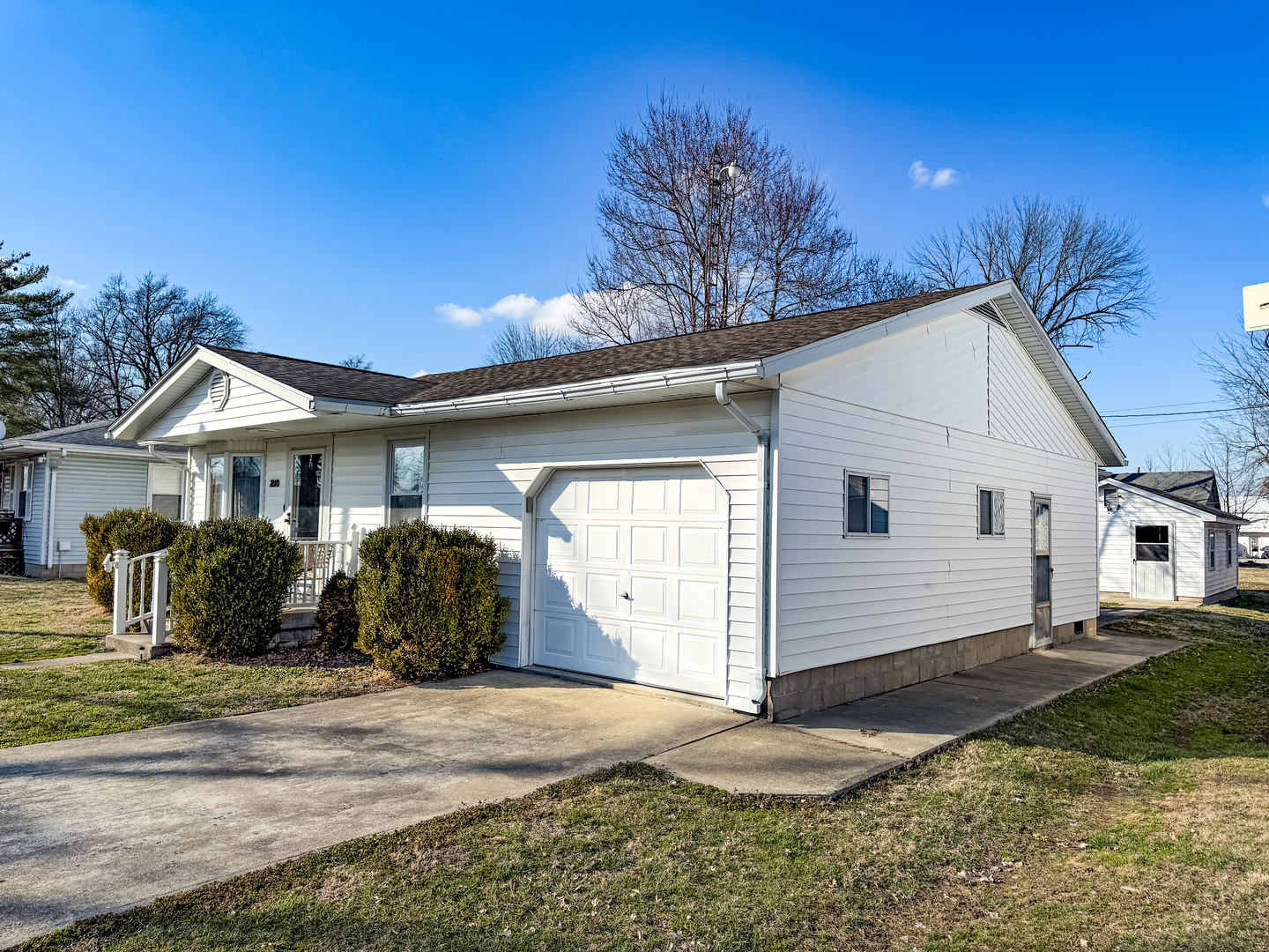 218 South 3rd Street Southwest Clay City, IL 62824 - Photo 61 of 63 a front view of a house with a yard