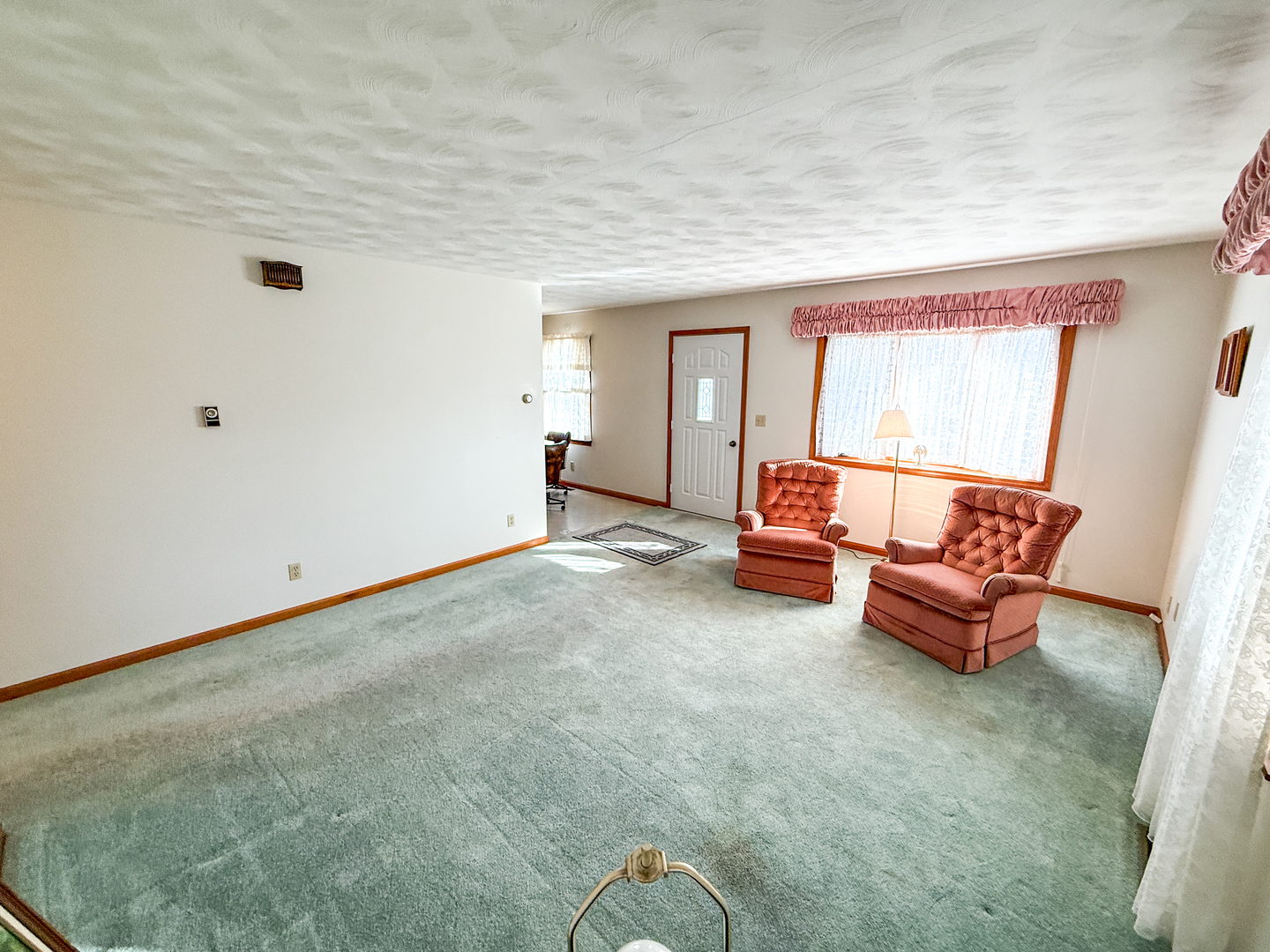 218 South 3rd Street Southwest Clay City, IL 62824 - Photo 7 of 63 a living room with furniture and a window