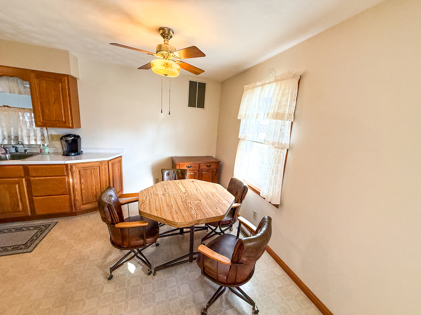 218 South 3rd Street Southwest Clay City, IL 62824 - Photo 10 of 63 a living room with furniture a chandelier and a window