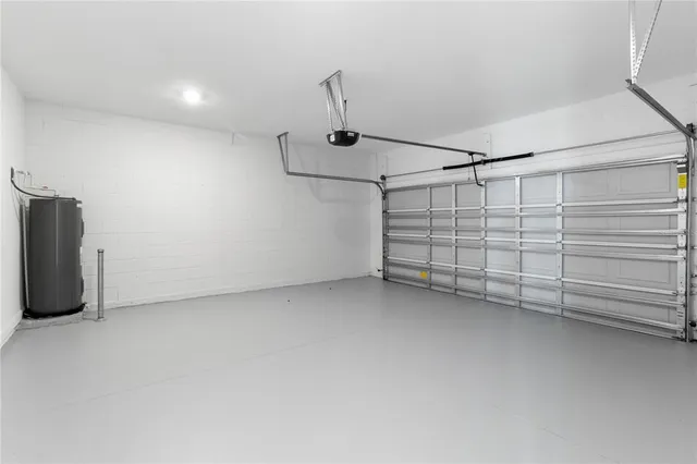 a view of entryway with window and wooden floor