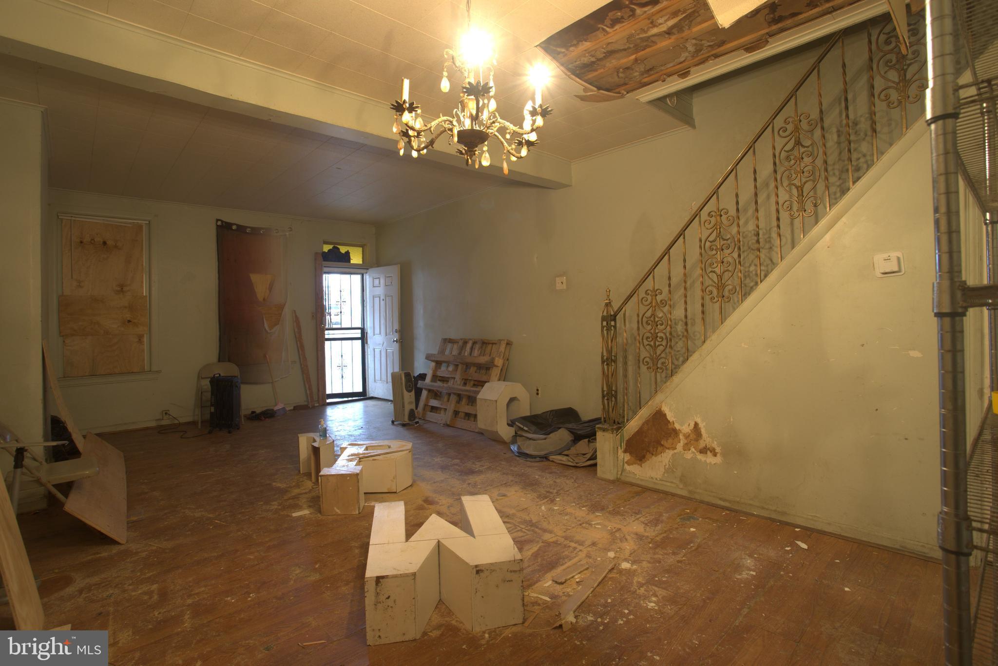 2140 South Simpson Street Philadelphia, PA 19142 - Photo 3 of 12 a lobby with furniture and a chandelier