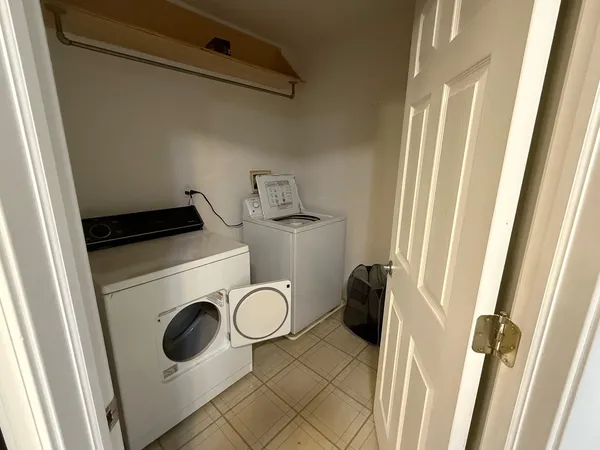 a bathroom with a toilet and a sink