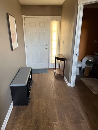 a room with furniture and a window
