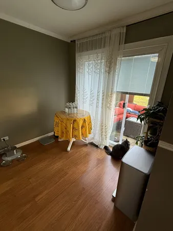 a room with gym equipment and a mirror