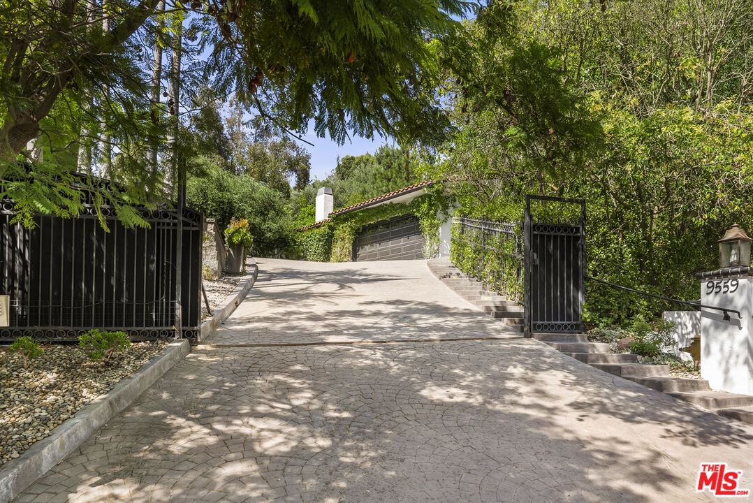 a view of a house with a tree