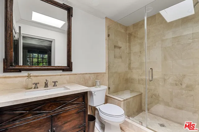 a room with a bed and a chair