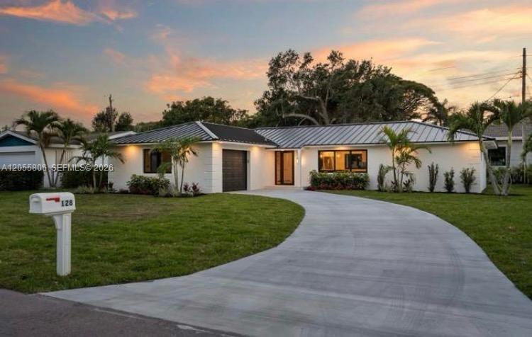 128 Norfolk Road Jupiter, FL 33469 - Photo 1 of 13