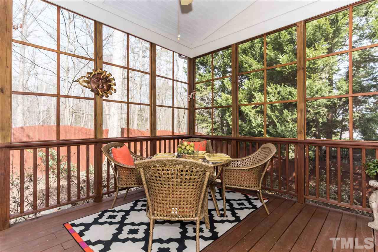 6521 Arbor Grande Way Raleigh, NC 27615 - Photo 11 of 12 a view of a chairs in wooden deck