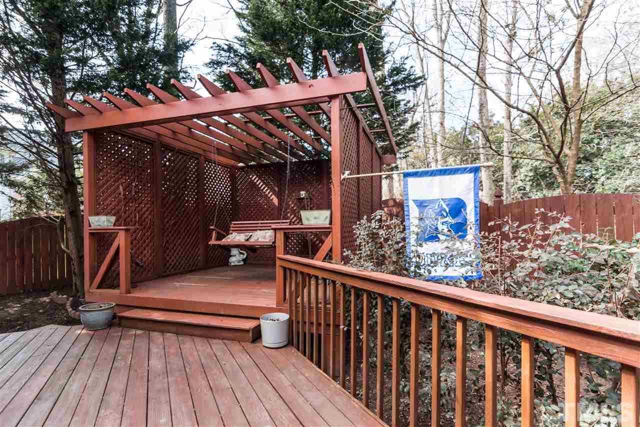 6521 Arbor Grande Way Raleigh, NC 27615 - Photo 12 of 12 a view of deck with wooden floor and outdoor seating