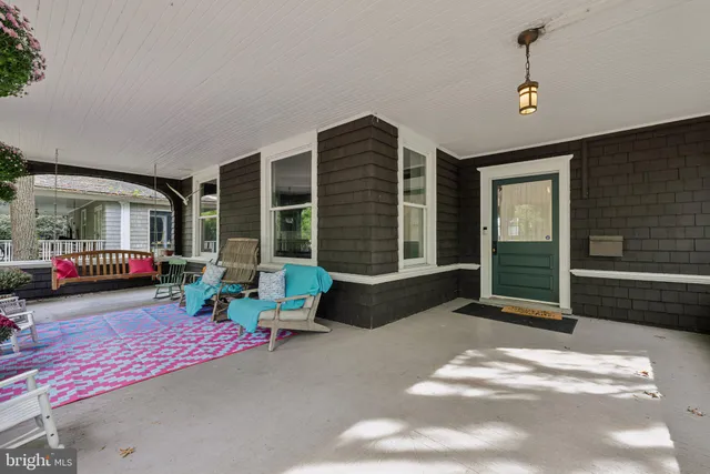 a living room with furniture and window